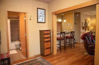a living room with a kitchen and a dining room at 1934 Soda Springs condo in Dillon