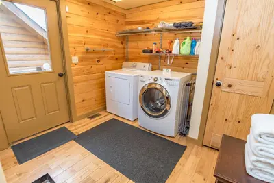a washer and dryer in a tiny house at Bear Creek Mining Lodge: Mountain Style, Hot Tub in Breckenridge Airport