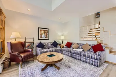 a living room with two couches and a coffee table at Cabin Creek Condos C-1 condo in Frisco