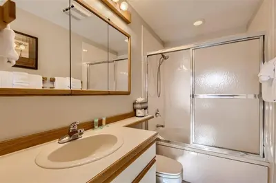 a bathroom with a sink and a shower at Cabin Creek Condos C-1 condo in Frisco