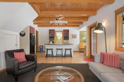 a living room with a couch and a table at 383 County Road 508 by Stay Winter Park in Fraser