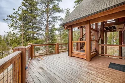 a wooden deck with a gazebo at The Seasons 1818 condo in Keystone