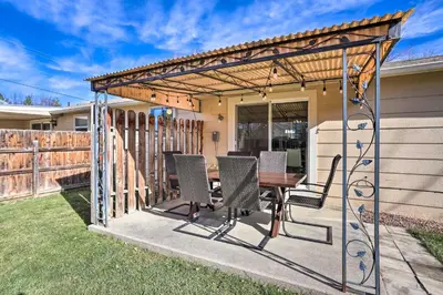 a pergola on a patio with a table and chairs at Duplex with Private Yard 3 Mi to Downtown Loveland! in Loveland