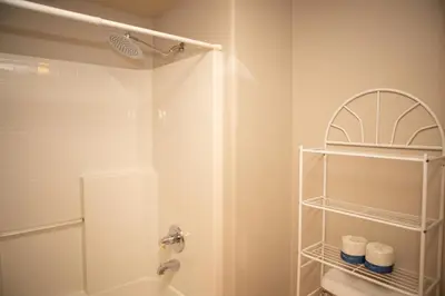 a bathroom with a shower and a toilet at 5016 Gateway condo in Keystone