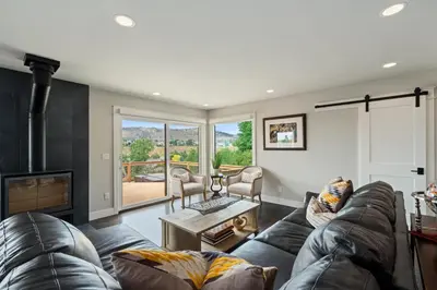 a living room with a couch and a fireplace at Outstanding Home, Incredible Views, Near Reservoir in Fort Collins