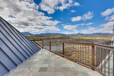 a balcony with a view of the mountains at Mountain Adventure Home Base - Ski, Hike and Chill! in Fraser