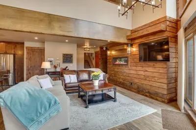 a living room with a couch and a table at Mountain Adventure Home Base - Ski, Hike and Chill! in Fraser
