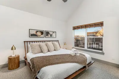 a bedroom with a large bed and a window at Old Town North Jewel! Near Breweries and River! in Fort Collins