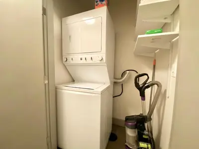 a white washer and dryer in a small room at Old Town North Jewel! Near Breweries and River! in Fort Collins