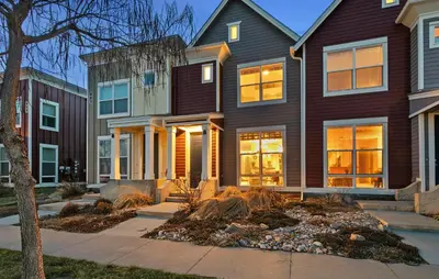 a home with a brown house at Old Town North Jewel! Near Breweries and River! in Fort Collins