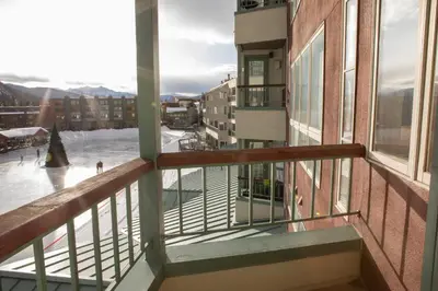 a balcony with a view of a rink at 1538 Lakeshore condo in Dillon