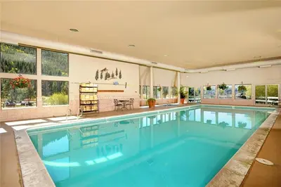 a large swimming pool in a large house at 1538 Lakeshore condo in Dillon