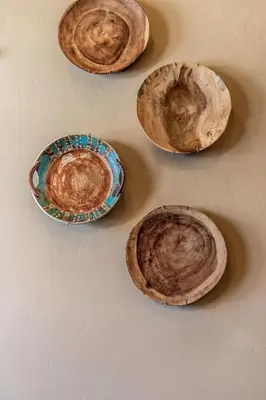 a group of wooden bowls sitting on a table at The Sanctuary Getaway - 192 home in Keystone