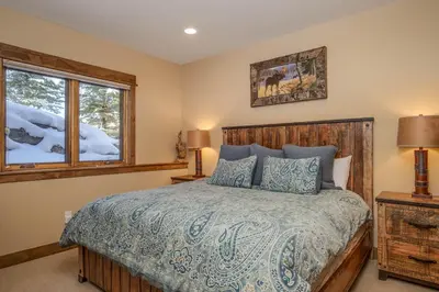 a bedroom with a bed and a window at The Sanctuary Getaway - 192 home in Keystone