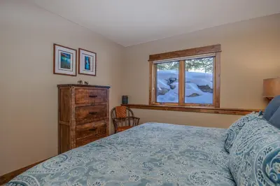 a bedroom with a bed and a window at The Sanctuary Getaway - 192 home in Keystone