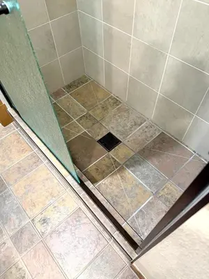 a shower with a glass door in a bathroom at Keystone Gulch Estate 1688 estate in Keystone