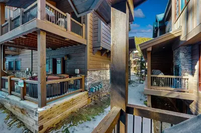 an aerial view of a log home with decks at Base Camp 496 in Winter Park