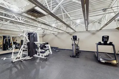a gym with several treadmills and machines at Snowblaze Condominiums E103 in Winter Park