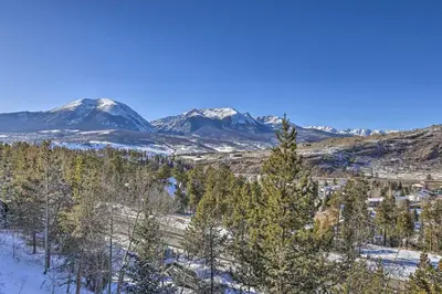 a view of snow covered mountains and trees at 7 Mi to Keystone Mtn-View Abode with Deck! in Dillon