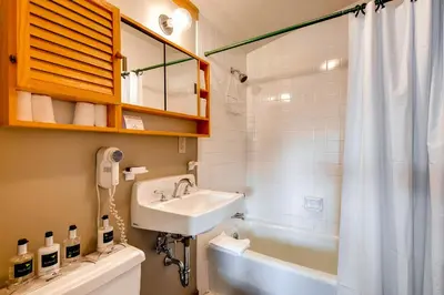a bathroom with a sink and a bath tub at Aspen Ridge Condominiums by Vail Resorts in Keystone