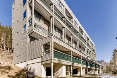 an apartment building with balconies on the side of it at Aspen Ridge Condominiums by Vail Resorts in Keystone