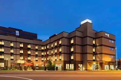 a rendering of a hotel building at night at Home2 Suites by Hilton Denver West / Federal Center in Lakewood