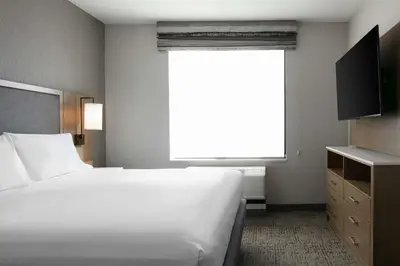 a bedroom with a large white bed and a window at Homewood Suites By Hilton Dillon in Dillon