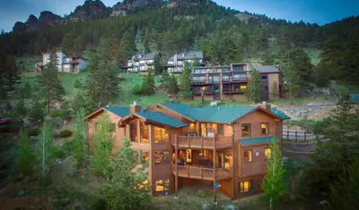an aerial view of a large house in the mountains at Elk Summit Vacation Home at Windcliff home in Estes Park
