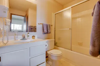 a bathroom with a sink and a toilet and a shower at Colorado Ski Condo in the Heart of Winter Park in Winter Park
