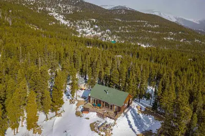 an aerial view of a house on a mountain at 2 Mi to St Marys Glacier Modern Cabin with Hot Tub in Idaho Springs