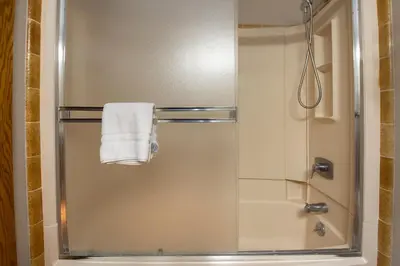 a shower with a white towel on a towel at Snowblaze Condos Building C unit 24 in Winter Park