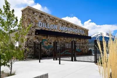 a building with a black gate in front of a mountain at Lake Cliffe E-305 - Dillon in Dillon