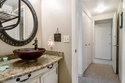 a bathroom with a sink and a mirror at Lakeview A-303 - Dillon in Dillon