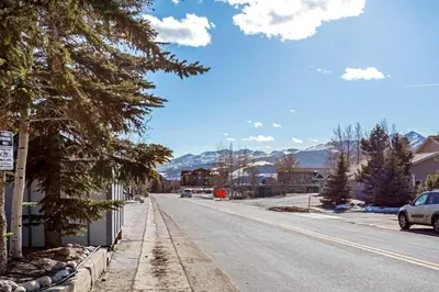 an empty street in a town with mountains at Lakeview A-303 - Dillon in Dillon