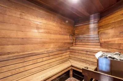 an empty wooden sauna with a bench in it at Snowscape 06 - Wildernest in Silverthorne