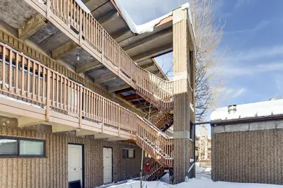 a building with a staircase on the side of it at Ten Mile Creek 304 condo in Frisco