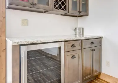 a kitchen with a counter with a dishwasher at Mountain Willow at Grand Park home in Fraser