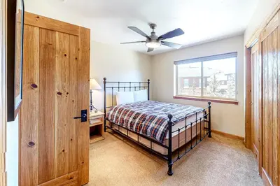 a bedroom with a bed and a ceiling fan at Dillon Dreamscape in Dillon