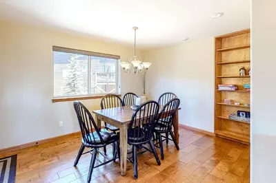 a dining room with a table and chairs at Dillon Dreamscape in Dillon