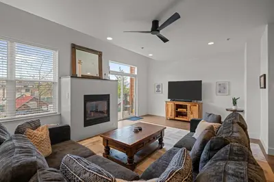 a living room with a couch and a fireplace at 539 Granite St in Frisco