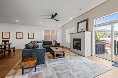 a living room with a couch and a fireplace at 539 Granite St in Frisco