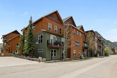a row of houses on a city street at 539 Granite St in Frisco