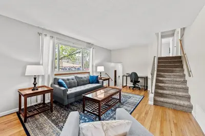a living room with a couch and a table at 5632 Field St in Arvada