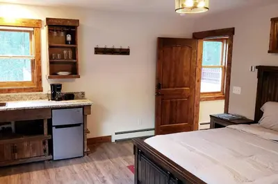 a kitchen with a sink and a counter top at Clear Creek Inn in Georgetown