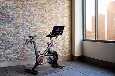 an exercise bike in a room with a window at Hyatt Centric Downtown Denver in Denver