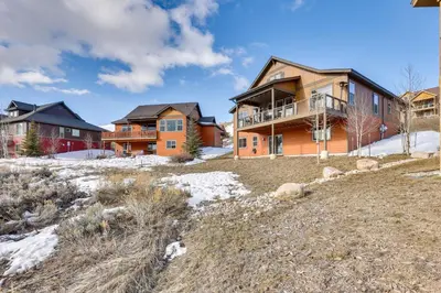 a home in a subdivision with snow at Spacious Granby Home with Views Less Than 2 Mi to Ski and Golf in Granby