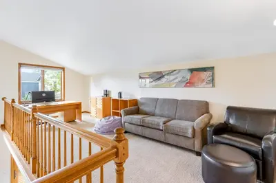 a living room with a couch and a chair at Mountain Vistas in Silverthorne