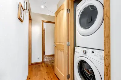 a laundry room with a washer and dryer at Mountain Vistas in Silverthorne