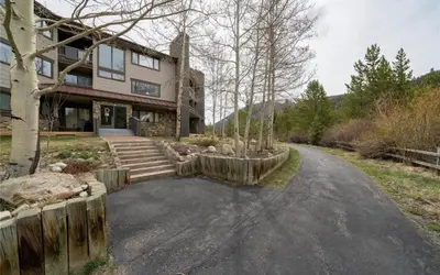 a house with a driveway in front of it at Frostfire D24 condo in Keystone