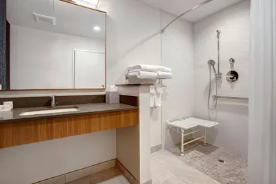 a bathroom with a sink and a shower at Fairfield by Marriott Inn & Suites Denver Southwest, Littleton in Littleton